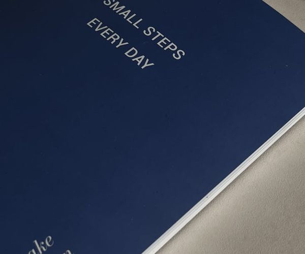 Small steps and repeating icons representing habit building